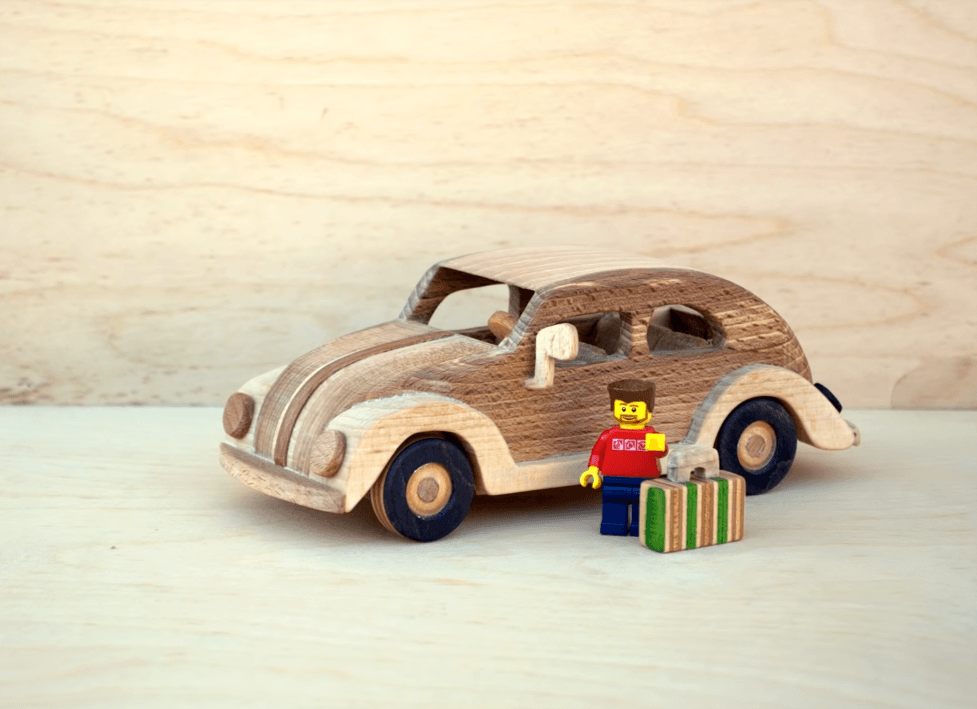 A Wooden Toy Volkswagen Beetle